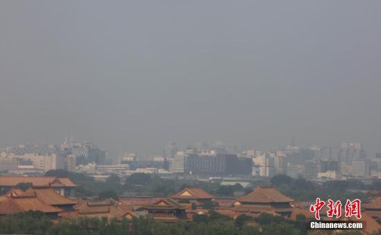 7月13日，高溫、高濕度空氣籠罩下的北京城區(qū)依舊處在高溫黃色預(yù)警中，當(dāng)日預(yù)報(bào)最高氣溫為36℃。 <a target='_blank' href='http://www.chinanews.com/' _fcksavedurl='http://www.chinanews.com/'></table>中新社</a>記者 楊可佳 攝